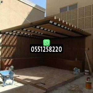 فني مظلات خشب